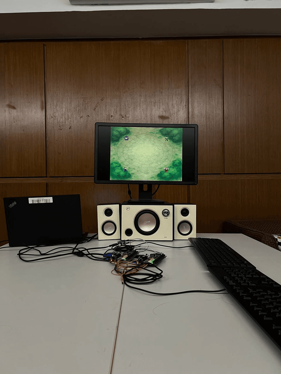 Entire monitor, keyboards, and system is set up for playing